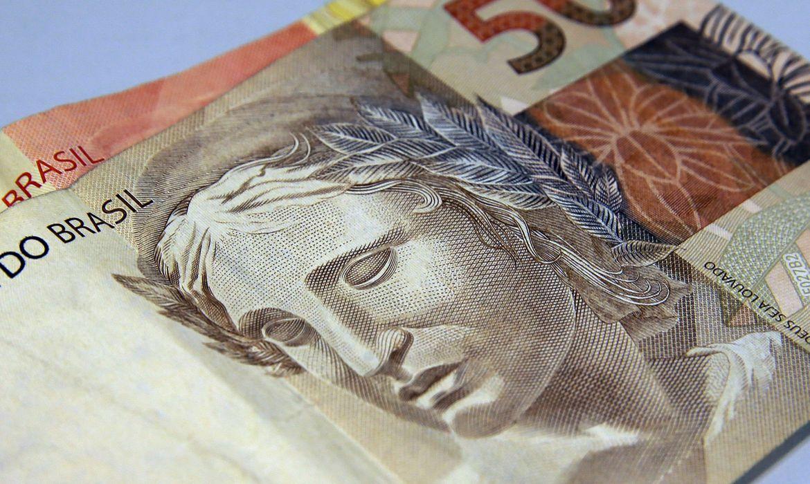 Auxílio emergencial é pago a beneficiários do Bolsa Família com NIS 1